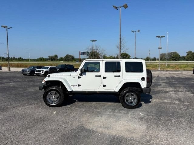 Used 2012 Jeep Wrangler Unlimited Rubicon with VIN 1C4BJWFG9CL251311 for sale in Creve Coeur, MO
